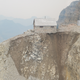 One side of the slope, at center, is falling out from beneath the structure.